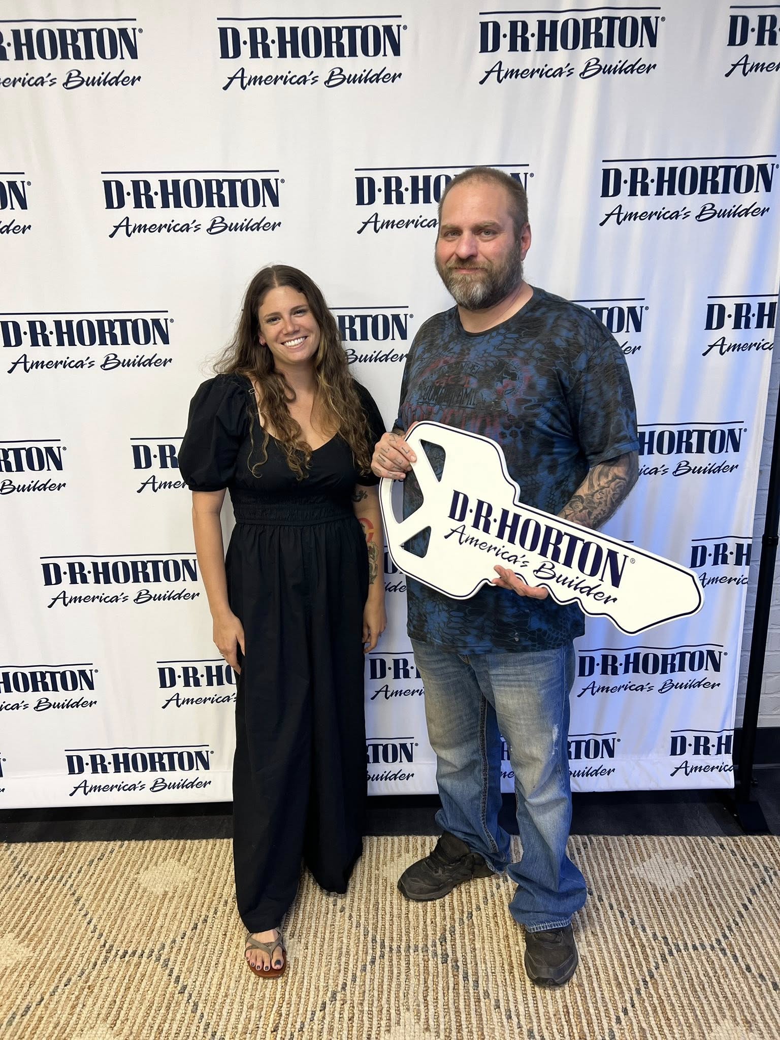 Tessa Hood Realtor with clients at a D.R. Horton new construction closing – Oklahoma City