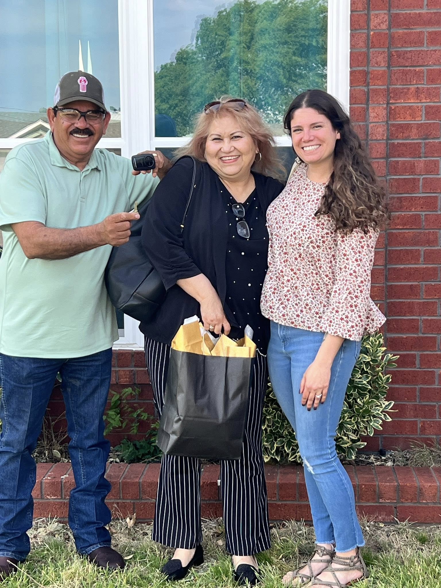 Tessa Hood Realtor with happy home buyers – Newcastle Oklahoma