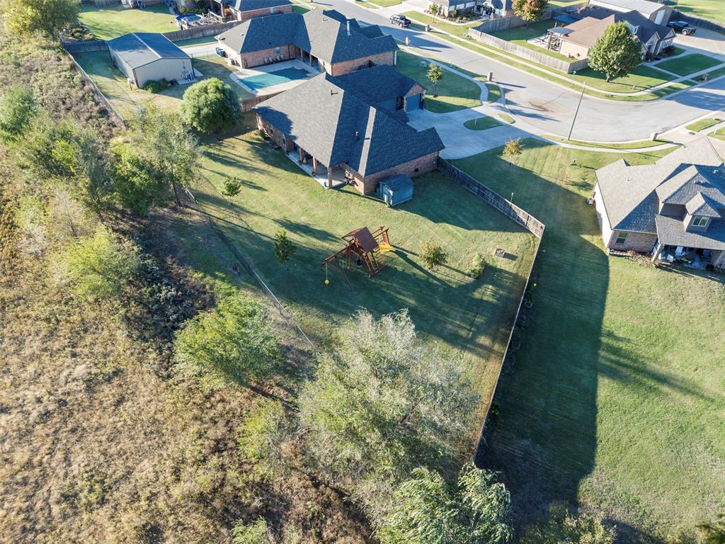 Tessa Hood Realtor – Aerial view of backyard and cul-de-sac setting at 516 Kings Ct, Tuttle Oklahoma
