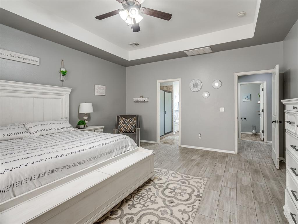 Tessa Hood Realtor – Primary bedroom second view with en-suite bath access at 5708 SE 148th St, Oklahoma City OK