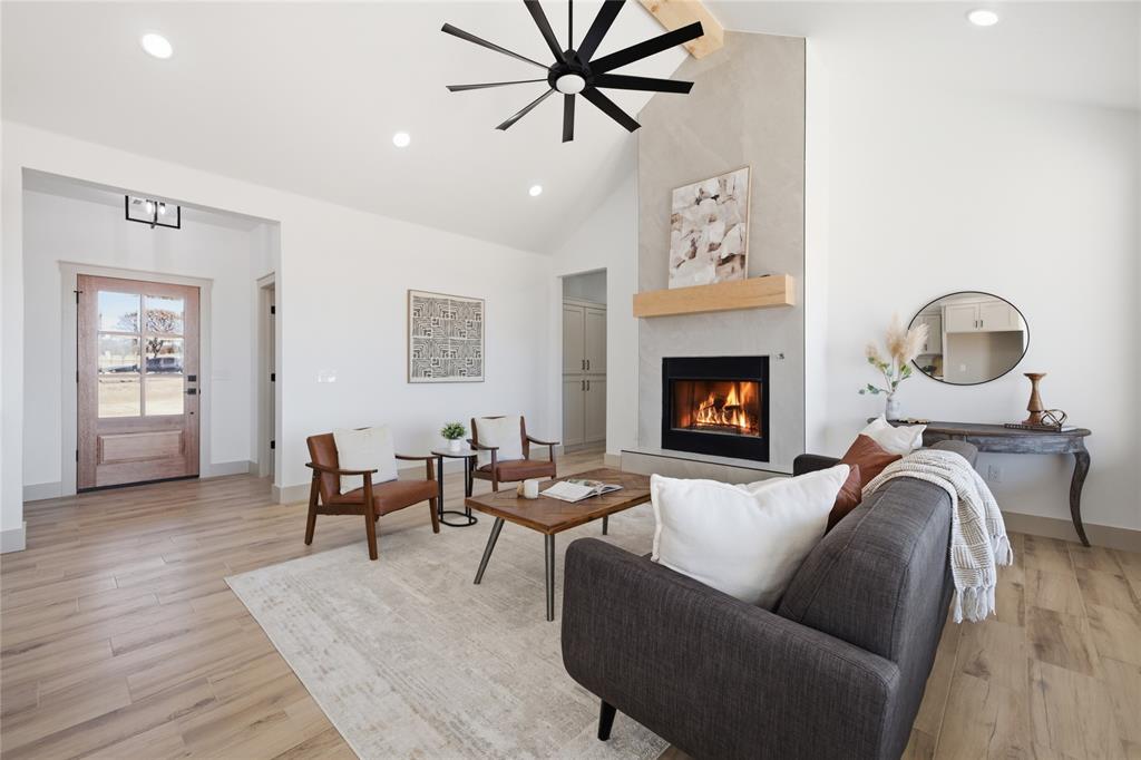 Tessa Hood Realtor – Vaulted living room with floor-to-ceiling fireplace at 2439 Wind River Cir, Blanchard Oklahoma