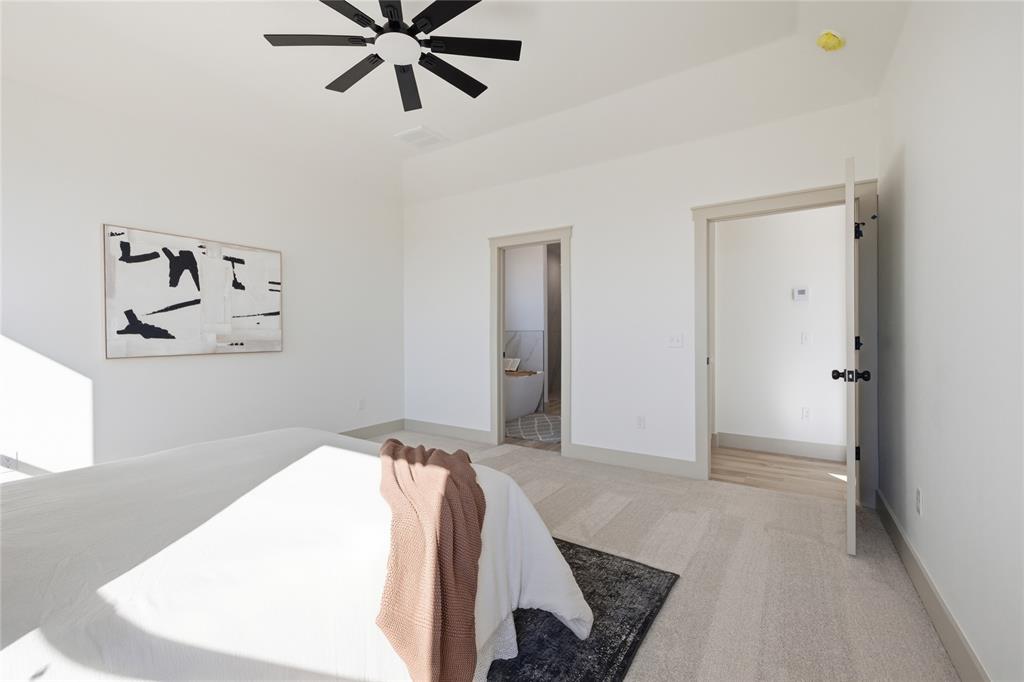 Tessa Hood Realtor – Primary bedroom suite with en-suite and walk-in closet entry at 2439 Wind River Cir, Blanchard Oklahoma